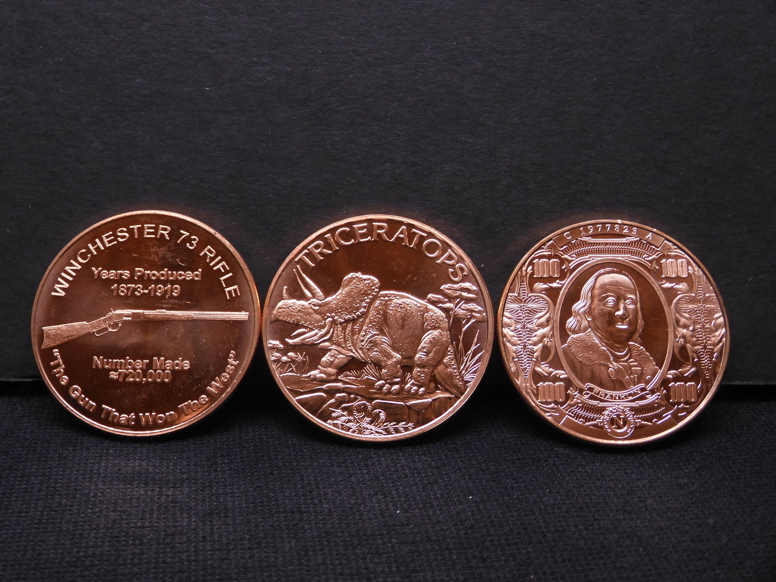 Three 1 Ounce .999 Fine Proof Copper Rounds Commemorating A Variety Of Themes: Triceratops,: Three 1 Ounce .999 Fine Proof Copper Rounds Commemorating A Variety Of Themes: Triceratops, Franklin, Rifle.