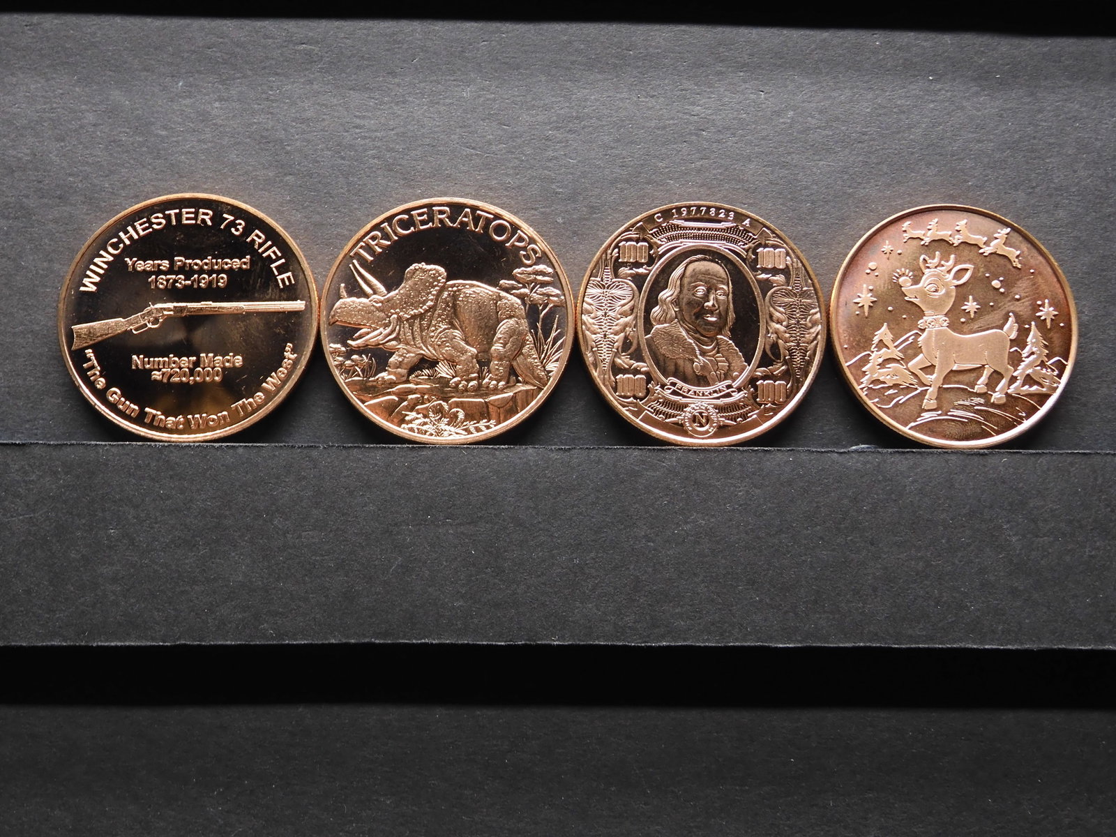 Four 1 Ounce .999 Fine Proof Copper Rounds Commemorating A Variety Of Themes: Triceratops, Rudolph,: Four 1 Ounce .999 Fine Proof Copper Rounds Commemorating A Variety Of Themes: Triceratops, Rudolph, Franklin, Rifle.
