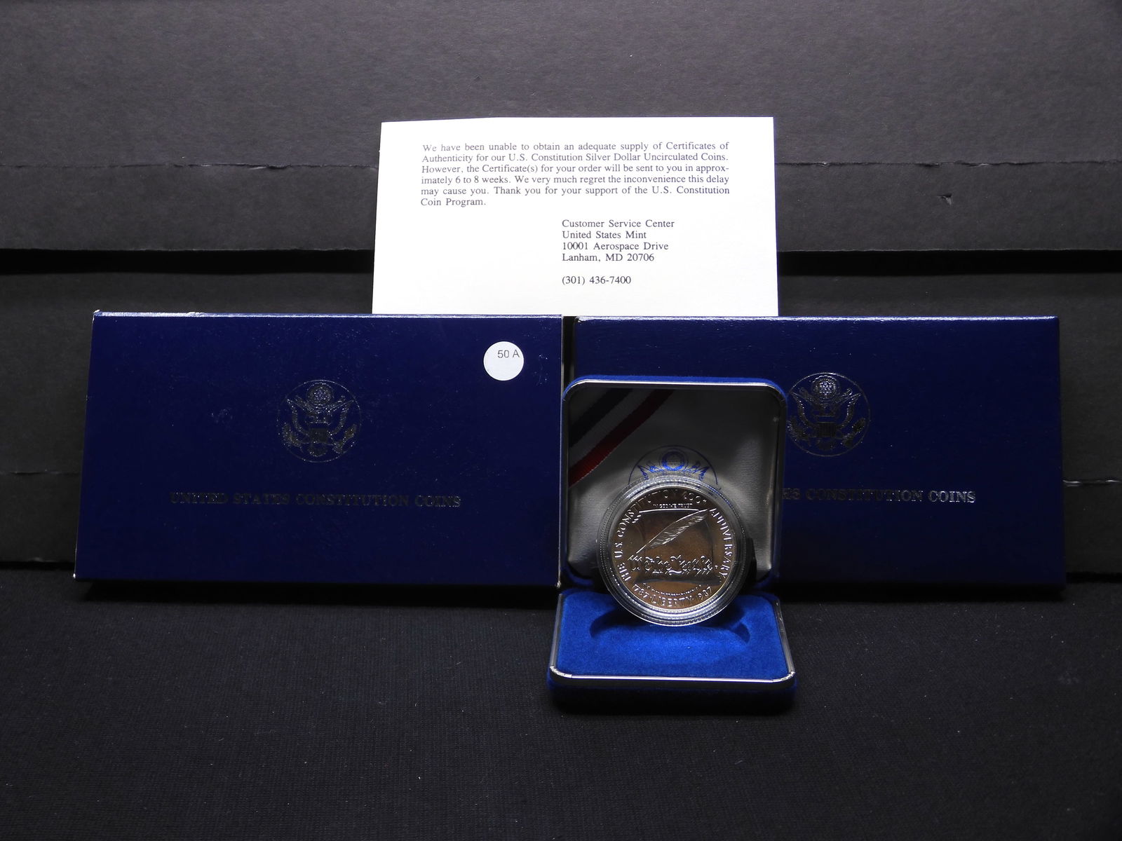 1987 P Constitution silver commemorative $1. GEM unc in original box plus card that promises a COA. (1 of 4)