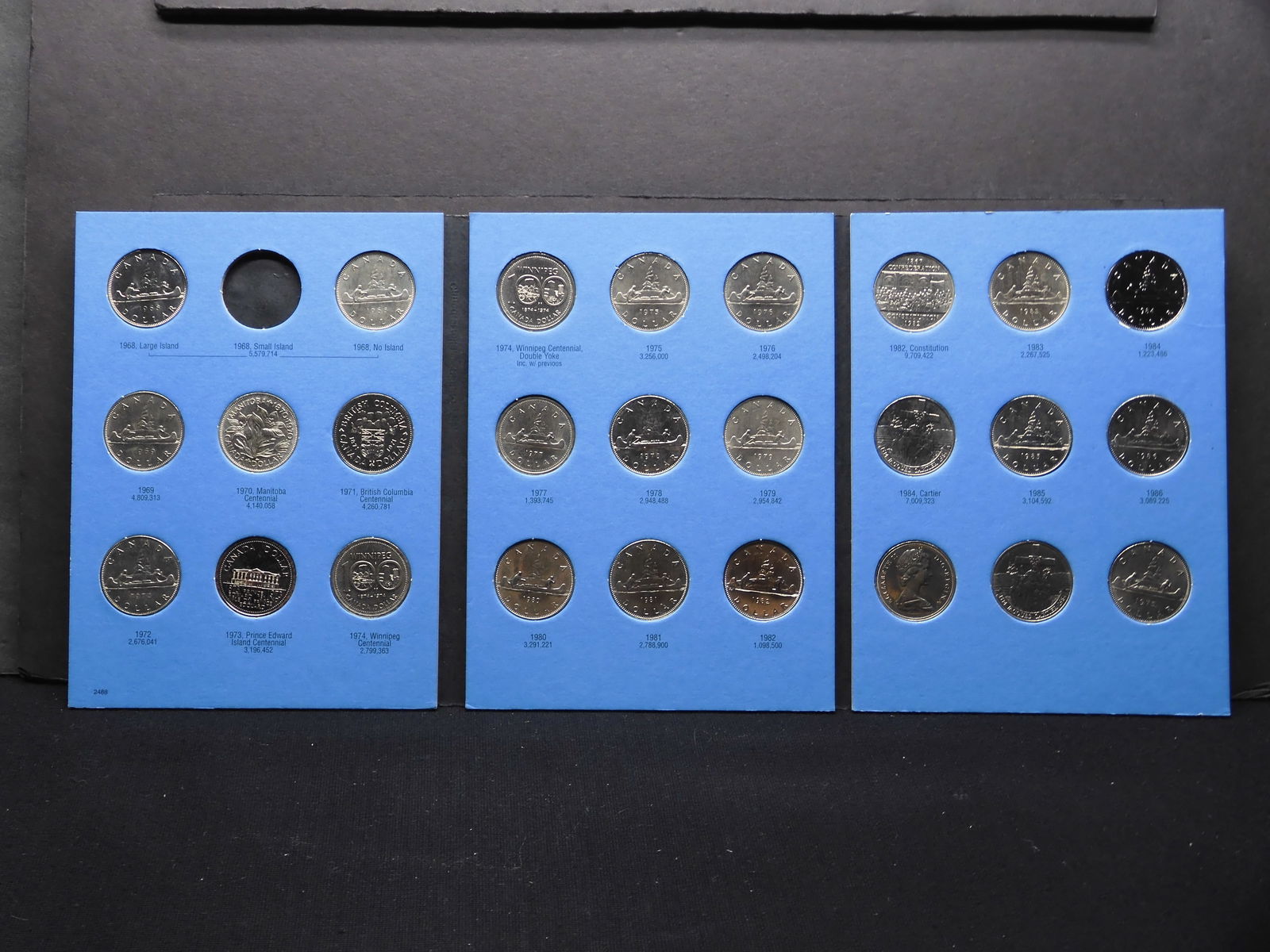 Whitman Tri-Fold - Partial Canada Dollar - 1968 to 1984: 1962 Franklin Half Dollar EMGC Slabbed MS66 FBL