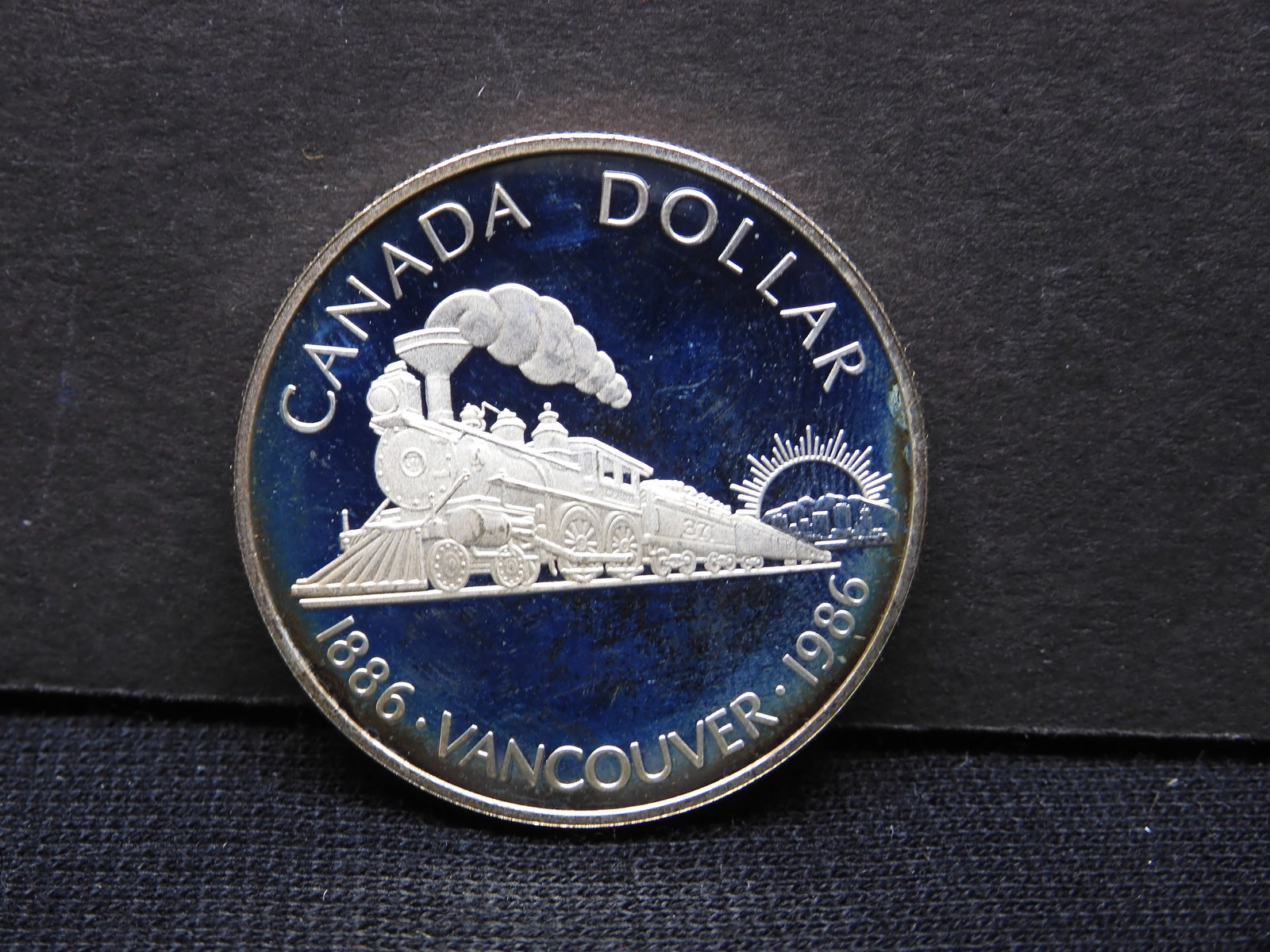 1986 Canadian Silver Proof Dollar: 1886-O Morgan Silver Dollar