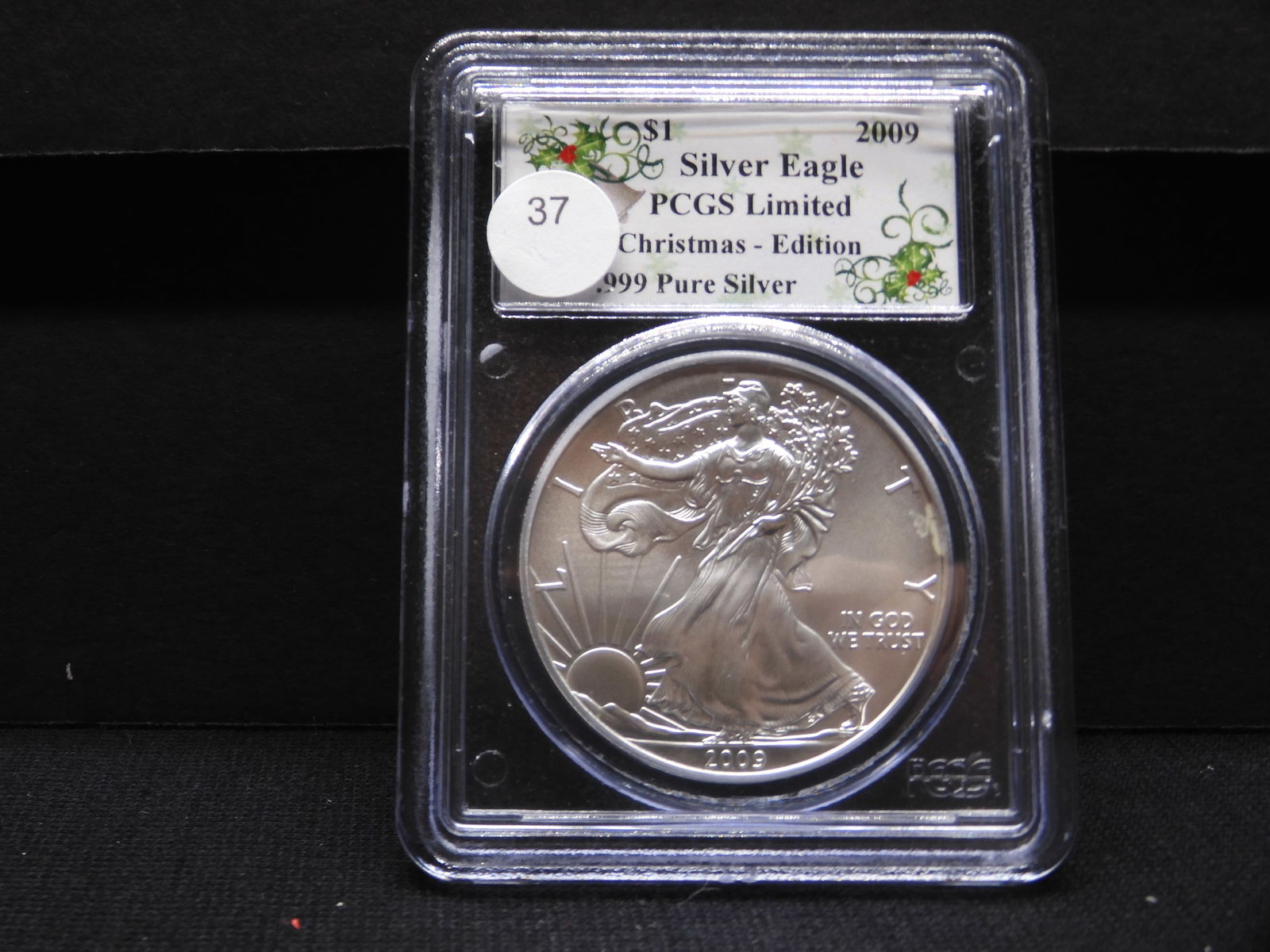 2009 American Silver Eagle. Slabbed by PCGS as Limited Christmas Edition.  GEM BU. (1 of 4)