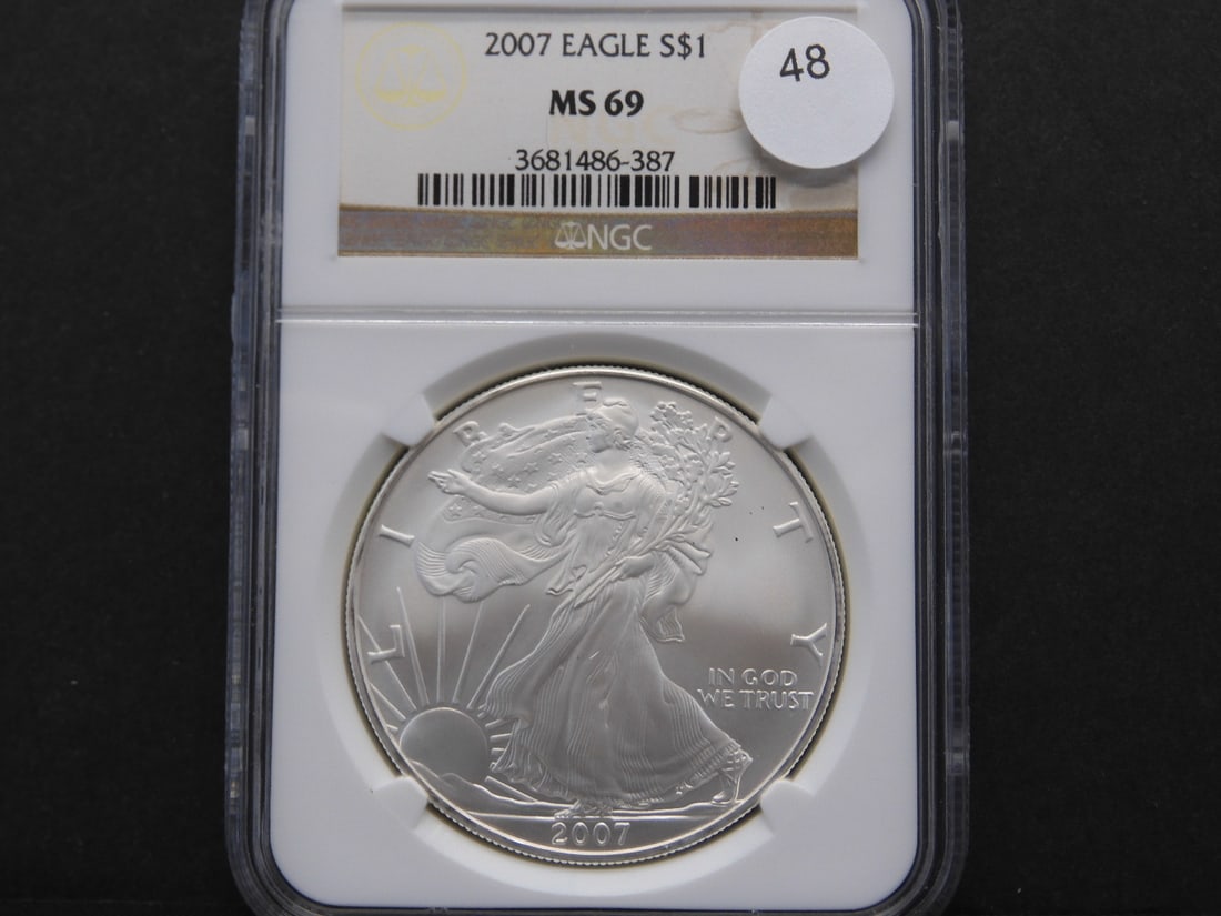2007 American Silver Eagle. Slabbed by NGC, top tier grader, as MS 69 in their classic brown holder. (1 of 3)