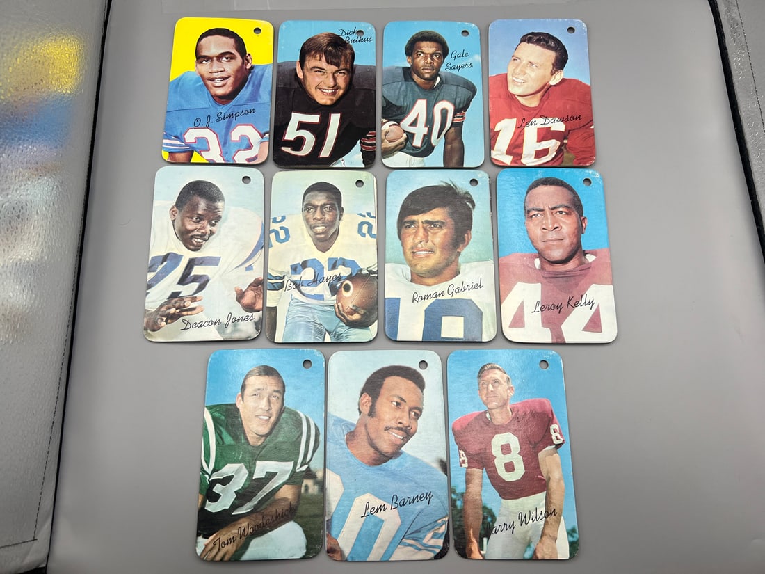 1970 Topps Super Football Card Lot (11) OJ Simpson Rookie, Butkus, Sayers, Dawson & Stars - All with: 1970 Topps Super Football Card Lot (11) OJ Simpson Rookie, Butkus, Sayers, Dawson & Stars - All with holes punched