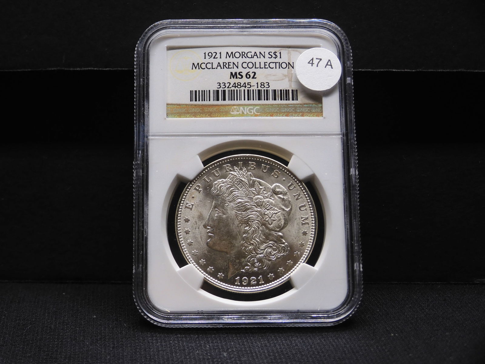 1921 Morgan Dollar. Slabbed by NGC, Top Tier Grader, as MS62. From the famous McClaren Collection. (1 of 4)