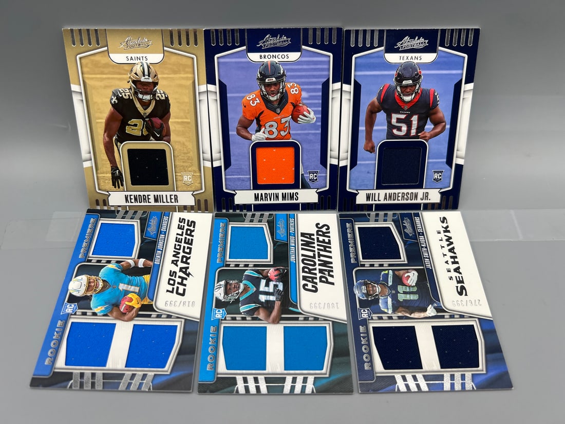Lot of (6) Assorted Football Rookie Jersey Relic Cards - 3 Are Numbered /399 - Varying Conditions - (1 of 2)