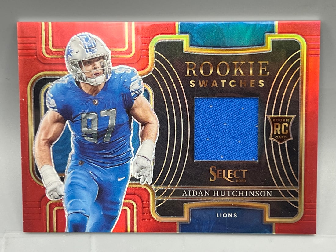 2022 Panini Select Aidan Hutchinson Red Rookie Swatches Relic #RSW-9: 2022 Panini Select Aidan Hutchinson Red Rookie Swatches Relic #RSW-9