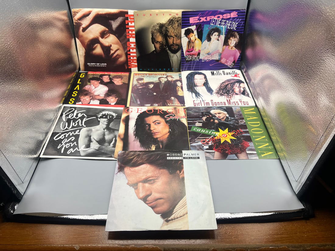 Ten (10) 45 rpm - 7 inch records in picture sleeves: Includes Peter Cetera, Eurythmics, Madonna, (1 of 4)
