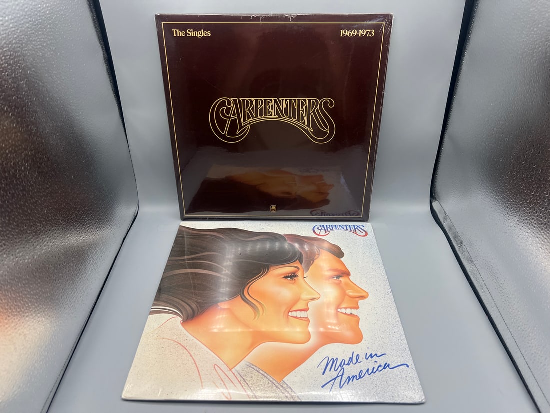 SEALED Carpenters (2 LP Lot): The Singles 1969-1973 - pressing date unknown, reissue; and Made in: SEALED Carpenters (2 LP Lot): The Singles 1969-1973 - pressing date unknown, reissue; and Made in America (1981). Both albums difficult to find SEALED.
