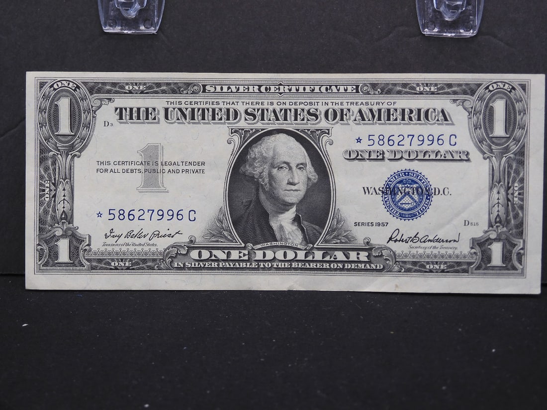 1957 STAR replacement $1 silver certificate. Crisp almost uncirculated. (1 of 3)