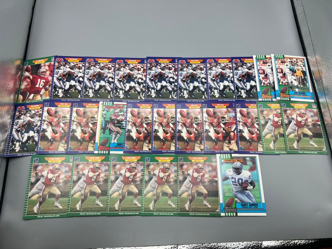 Lot of (25+) Assorted Football Star Player Cards - Varying Conditions - Barry Sanders, Dan Marino,: Lot of (25+) Assorted Football Star Player Cards - Varying Conditions - Barry Sanders, Dan Marino, Steve Young