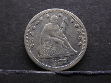 1877-CC United States Seated Liberty Quarter.  Rare Type Coin.  Bold Liberty.
