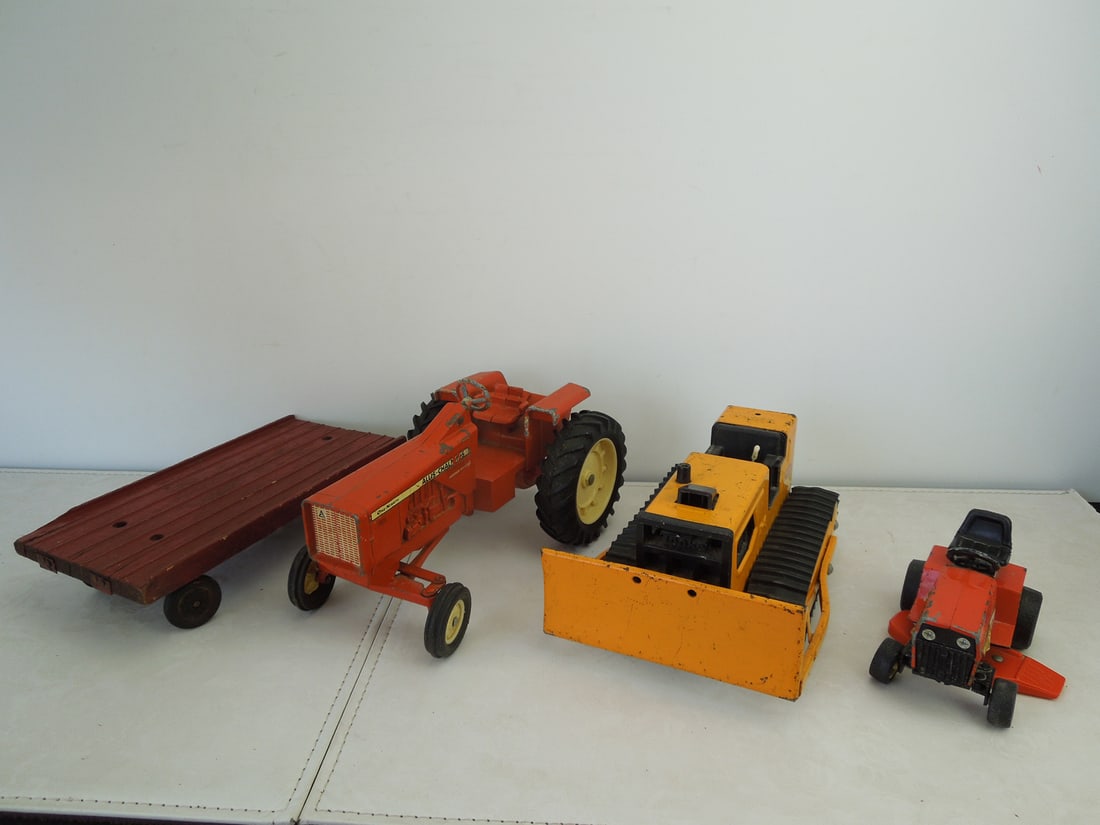 Lot Of Misc. Metal Tractors, Lawnmower, And Wooden Wagon: Lot Of Misc. Metal Tractors, Lawnmower, And Wooden Wagon
