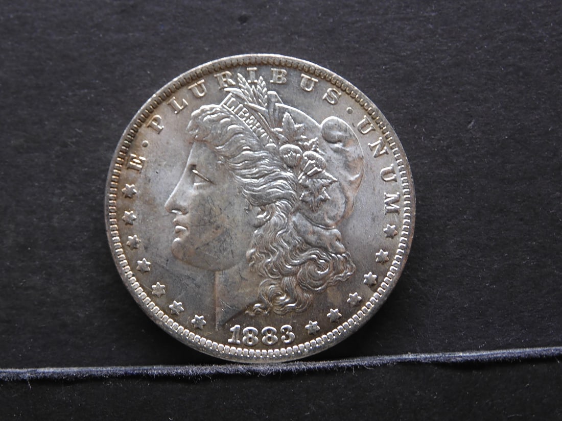 1883-O AU/MS Morgan Silver Dollar (1 of 2)