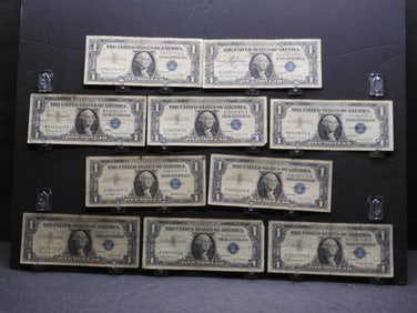 10 - $1 Silver Certs.  1957, (9) 1957-B. Circulated.