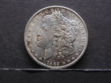 1889 AU Morgan Silver Dollar