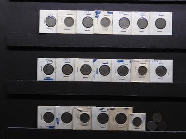 23 U.S. Nickels.  1 - War, 9 - Buffalo, + 13 - V-Nickels.