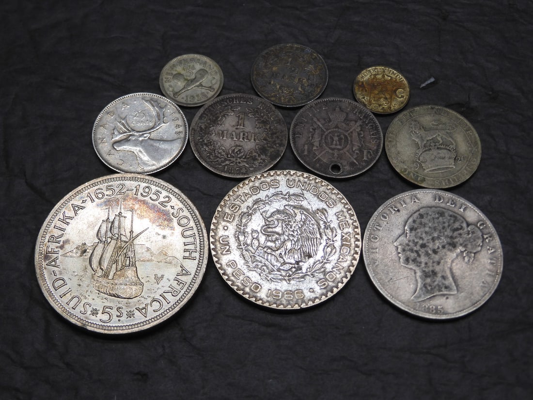 10 Silver Foreign Coins. (1 of 4)