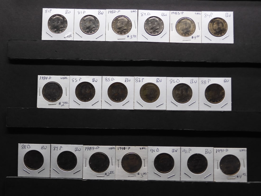 19 different BU Kennedy Halves, from 1981-P to 1991-D. Missing only the 83-D, 87-P and 87-D.: 19 different BU Kennedy Halves, from 1981-P to 1991-D. Missing only the 83-D, 87-P and 87-D.
