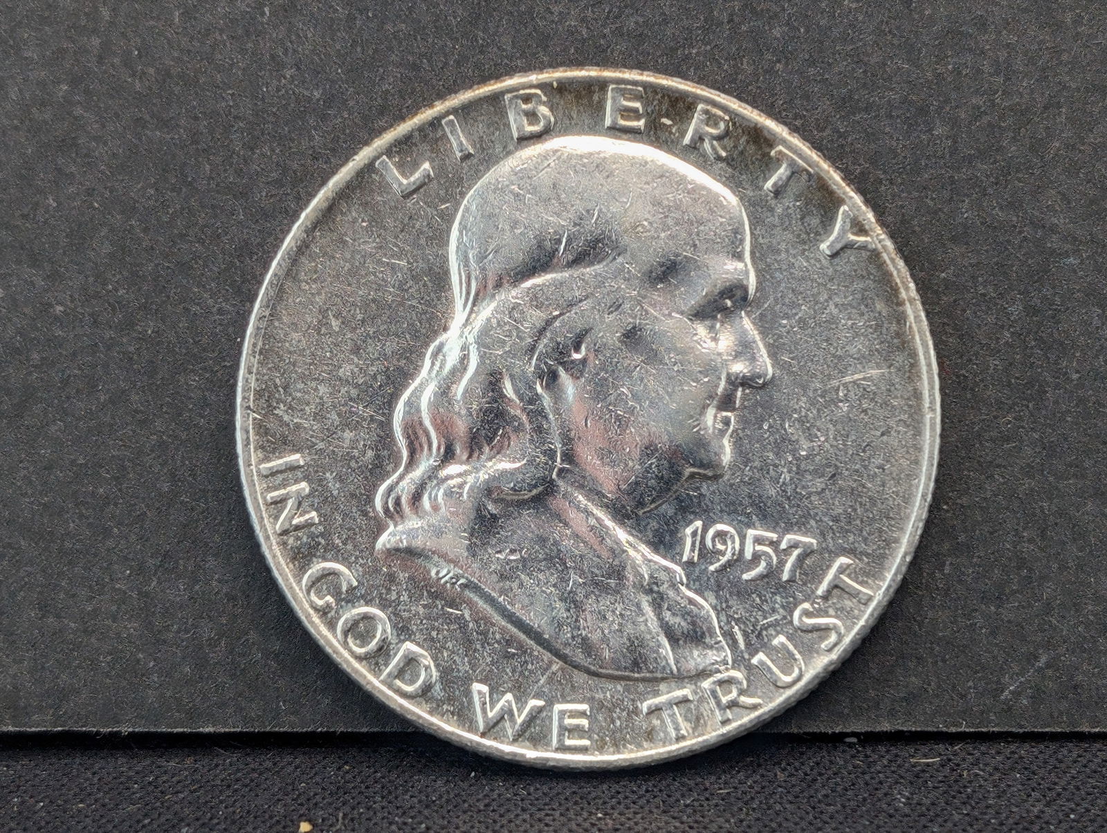 1957-D Franklin Half Dollar. UNC. 90% Silver (1 of 2)
