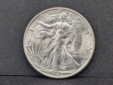 1942 Walking Liberty Half. Very choice BU from original roll. Great luster.