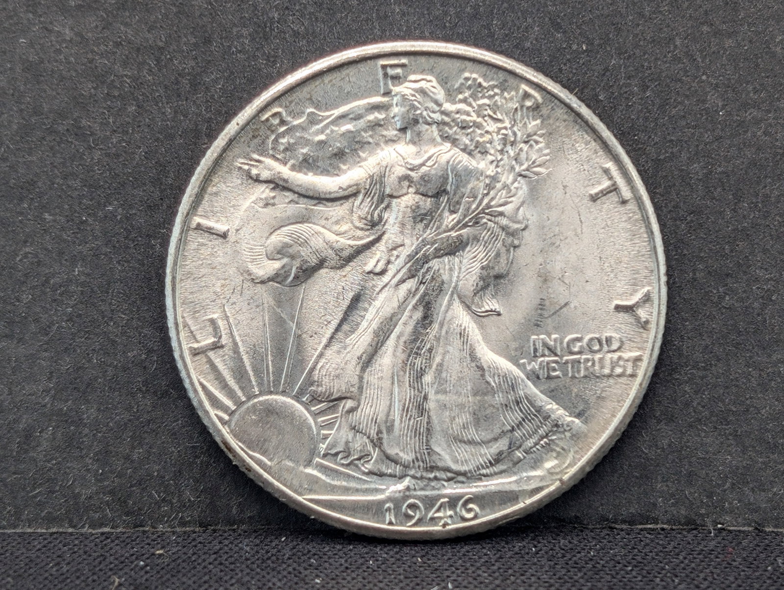 1946-D Walking Liberty Half. Very choice BU from original roll. Great luster.: 1946-D Walking Liberty Half. Very choice BU from original roll. Great luster.