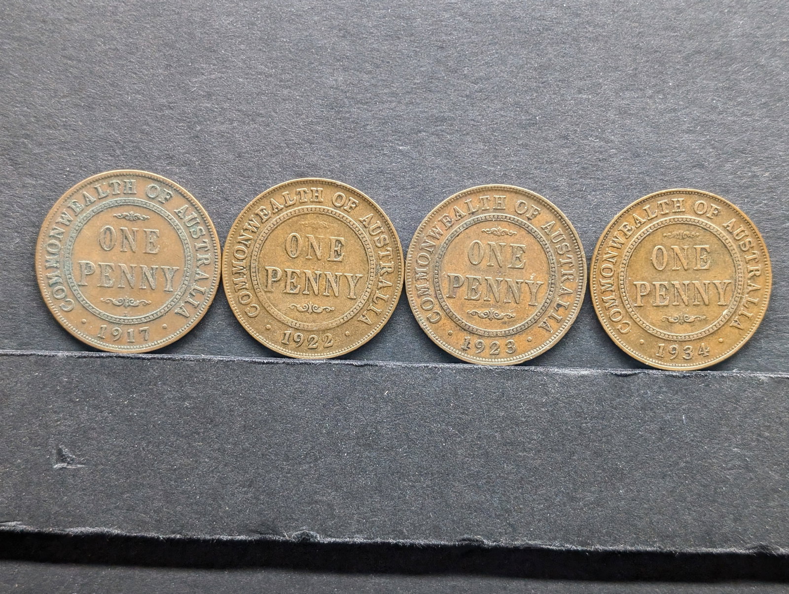Lot of FOUR (4) Australia 1 Penny Coins - George V: Lot of FOUR (4) Australia 1 Penny Coins - George V
