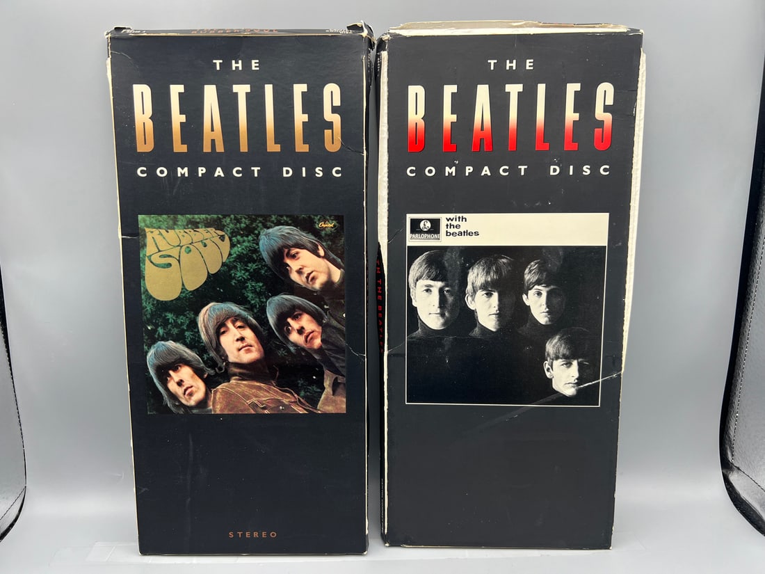 The Beatles Longbox CDs (2 Box Lot): Rubber Soul (1987) and With the Beatles (1987); these are very (1 of 2)