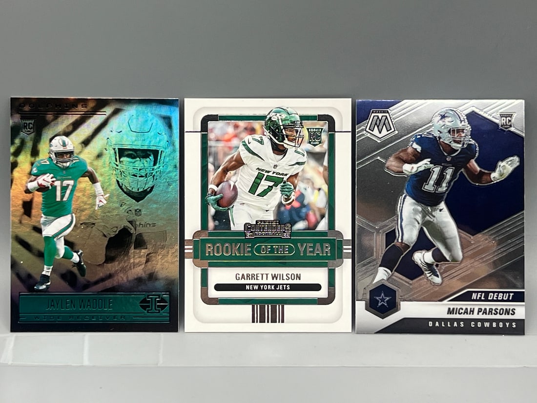 Lot of (3) Football Star Player Rookie Cards -Varying Conditions - Jaylen Waddle, Garrett Wilson, (1 of 2)