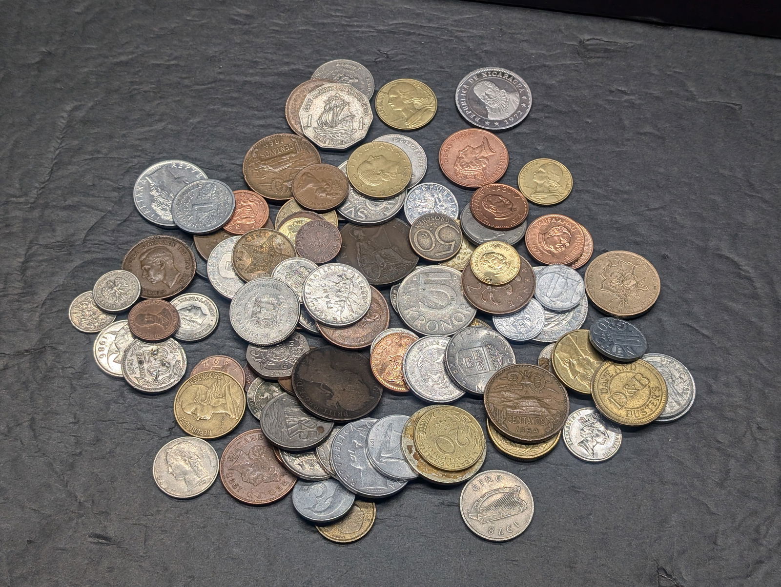 One pound plus of unsearched foreign coins. Nice older mix. (1 of 5)