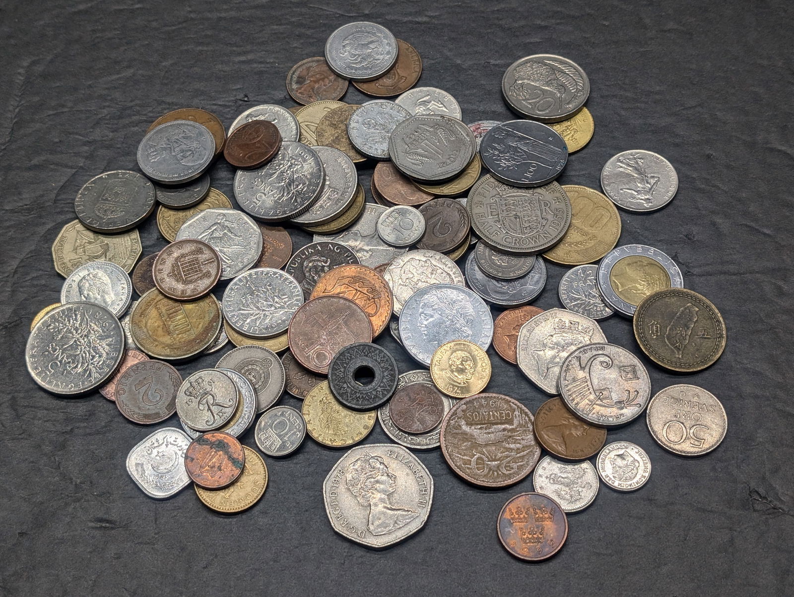 One pound plus of unsearched foreign coins. Nice older mix. (1 of 6)