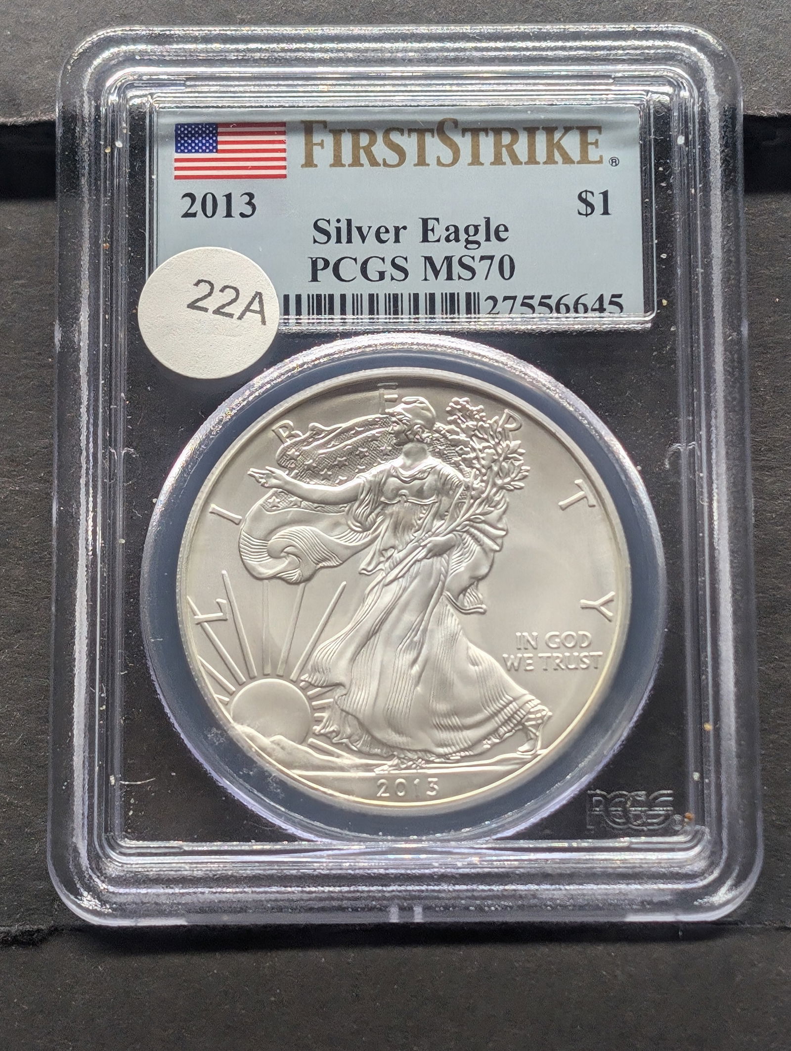 2013 American Silver Eagle. Slabbed by PCGS, top grader as perfect MS 70, First Strike. (1 of 4)