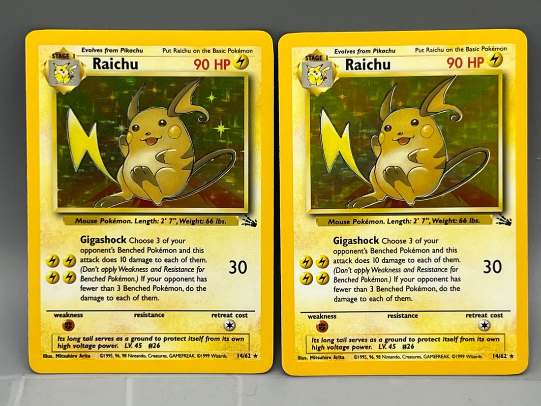 Lot of (2) 1999 Pokemon Fossil Raichu Holo #14/62: Lot of (2) 1999 Pokemon Fossil Raichu Holo #14/62