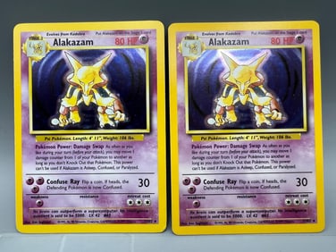Lot of (2) 1999 Pokemon Base Set Alakazam Holo #1/102