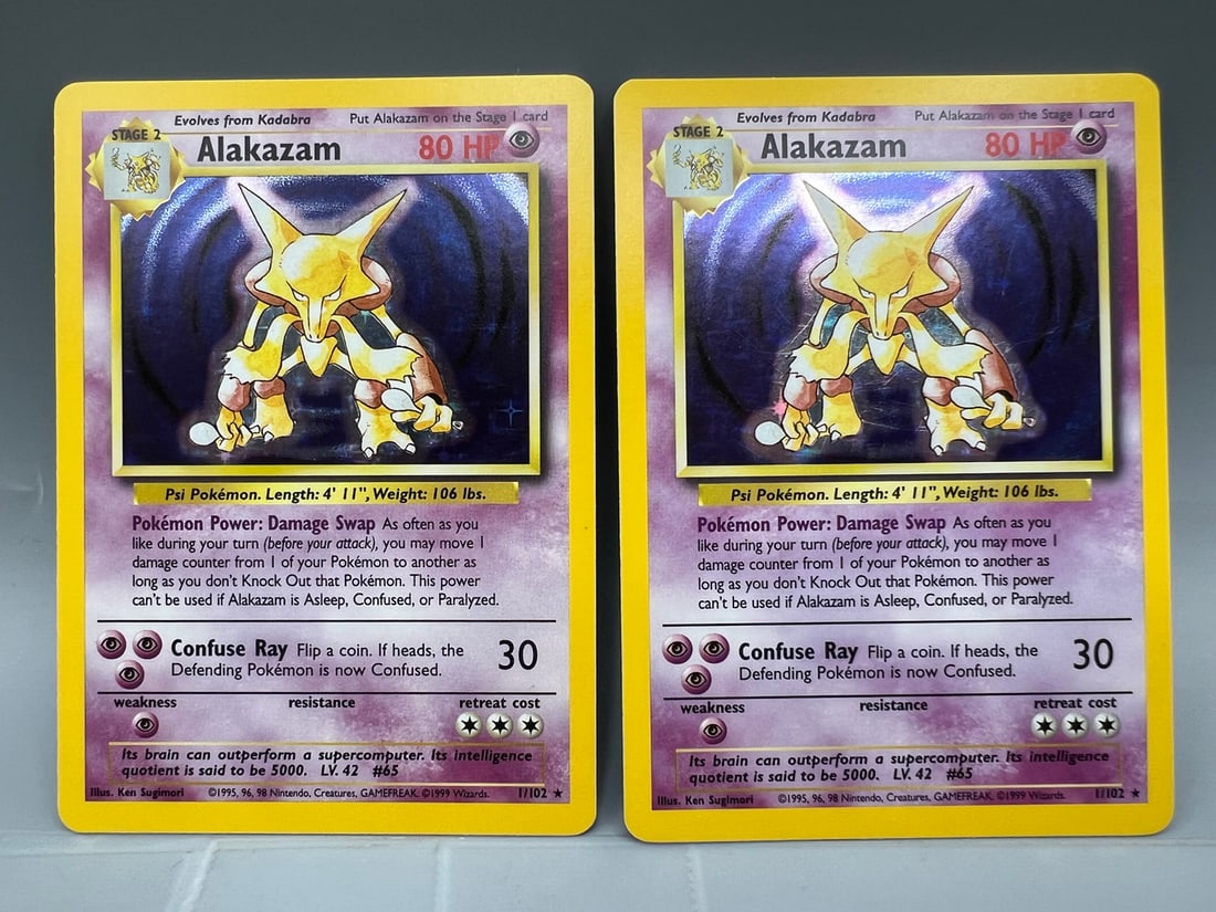 Lot of (2) 1999 Pokemon Base Set Alakazam Holo #1/102: Lot of (2) 1999 Pokemon Base Set Alakazam Holo #1/102
