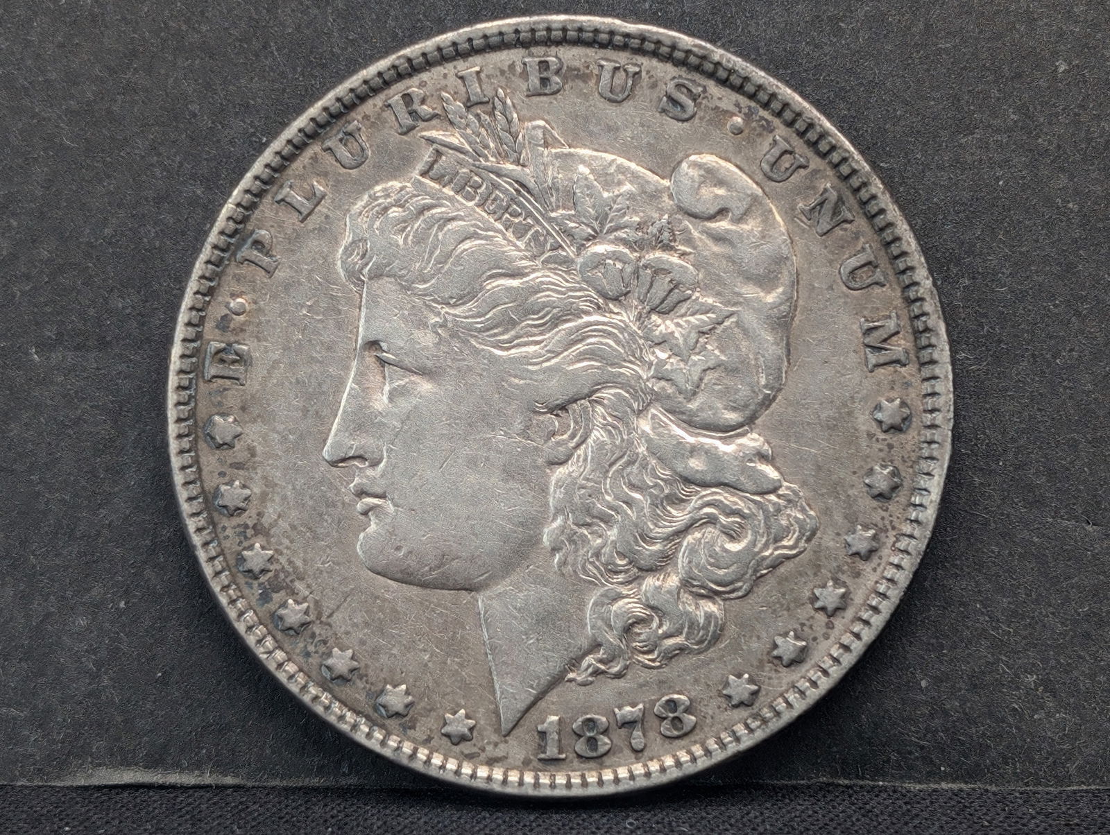 1878 Semi-Key Date United States Morgan Silver Dollar.  First Year Of Issue. (1 of 2)