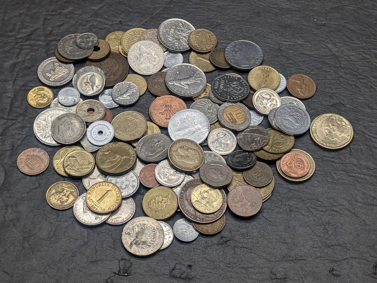 One pound plus of unsearched foreign coins. Nice older mix. (1 of 6)