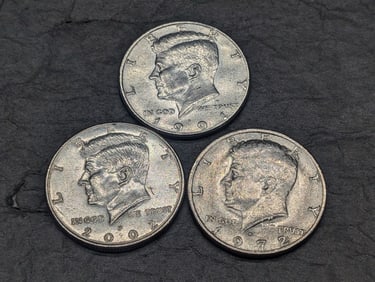 Errors-(3) Kennedy Half Dollars- 2 Damaged Planchet, One 1972-D Light Strike FG