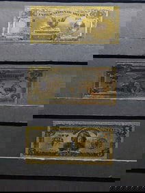 Three gold foil copies of classic US currency: $1 Black Eagle, $2 1899 Washington, $5 1896 Chief.