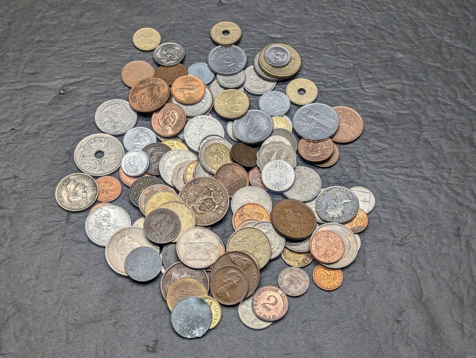One pound plus of unsearched foreign coins. Nice older mix. (1 of 5)