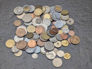 One pound plus of unsearched foreign coins. Nice older mix.