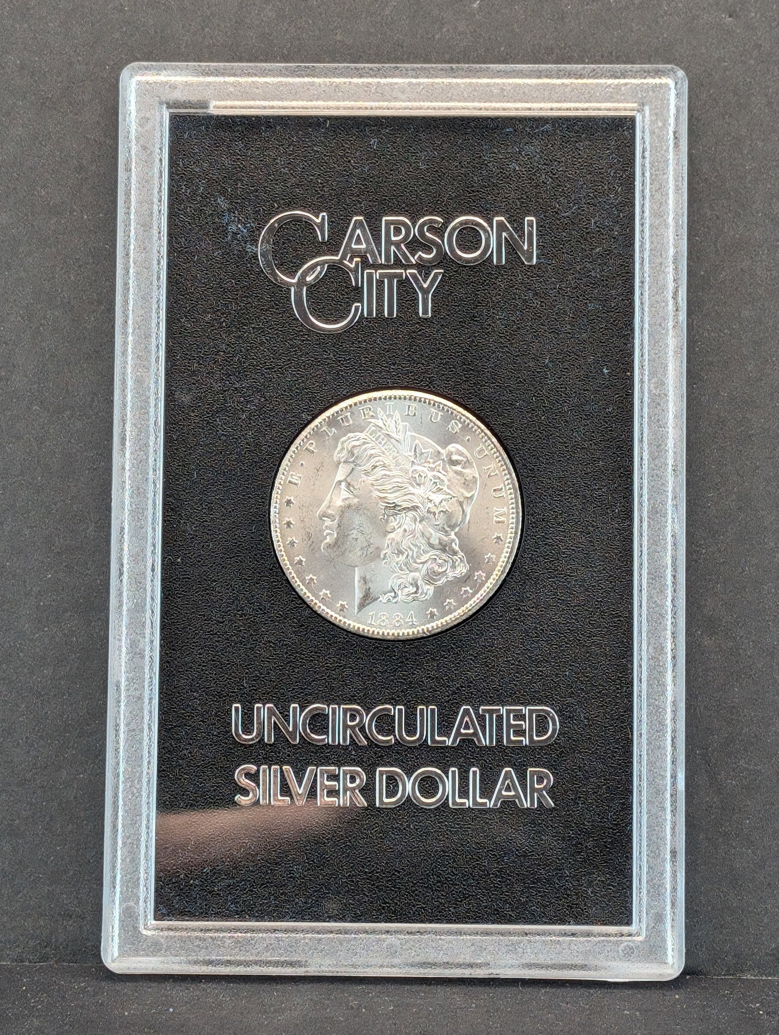 1884-CC Morgan Silver Dollar in GSA Box: 1884-CC Morgan Silver Dollar in GSA Box