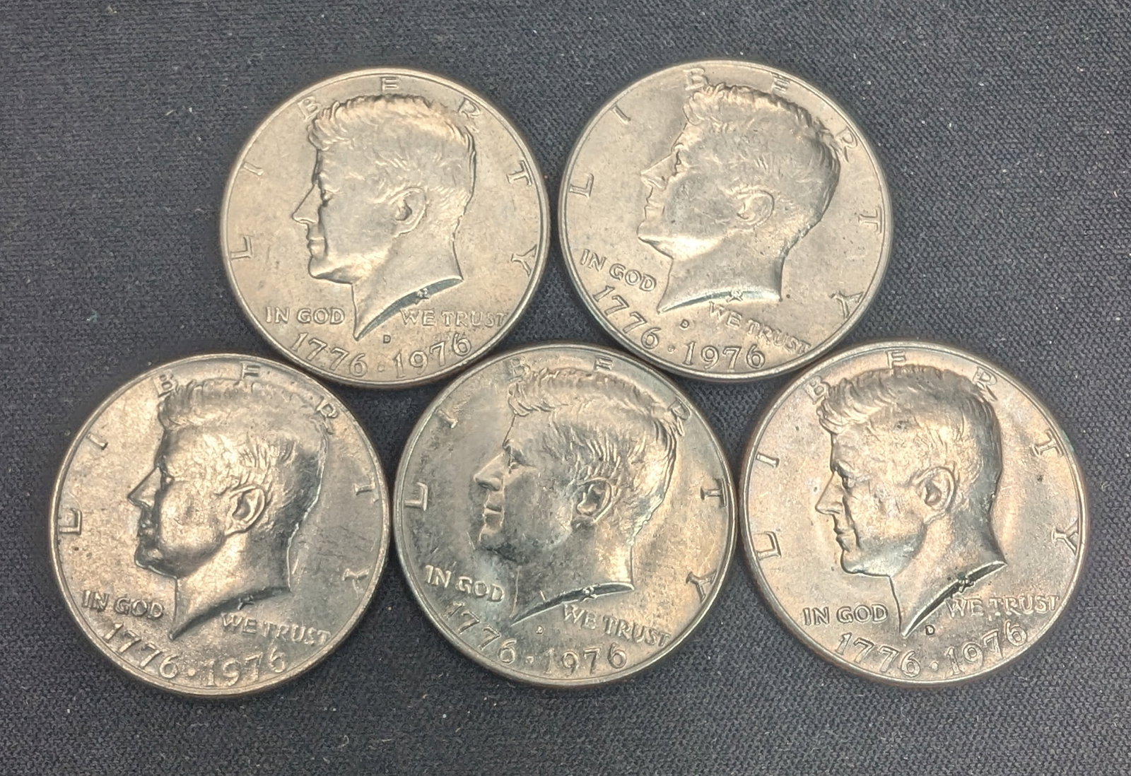 (4) 1976-D & (1) 1976-P Kennedy Half Dollars: (4) 1976-D & (1) 1976-P Kennedy Half Dollars