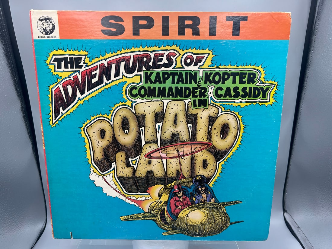 Spirit: The Adventures of Kaptain Kopter & Commander Cassidy in Potato Land (1981), includes: Spirit: The Adventures of Kaptain Kopter & Commander Cassidy in Potato Land (1981), includes lyric-filled comic book, promo-notch in cover