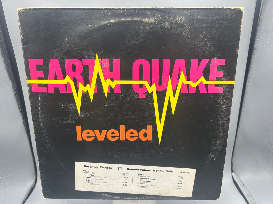 1977 Earthquake Leveled Vinyl Album W/ Demo Sticker - BZ-0054: 1977 Earthquake Leveled Vinyl Album W/ Demo Sticker - BZ-0054