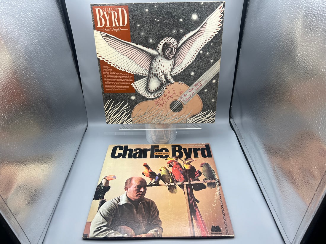 Charlie Byrd (2 LP Lot): First Flight (1980), AUTOGRAPHED, top seam has 3-inch split; and Latin Byrd: Charlie Byrd (2 LP Lot): First Flight (1980), AUTOGRAPHED, top seam has 3-inch split; and Latin Byrd (1973), gatefold, 2 LPs