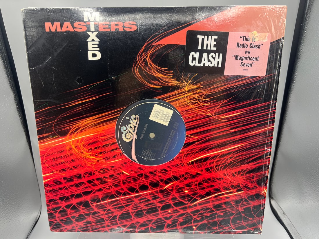 The Clash: 12-inch 33 1/3rpm single: The Magnificent Dance/This is Radio Clash (1989), reissue, (1 of 4)