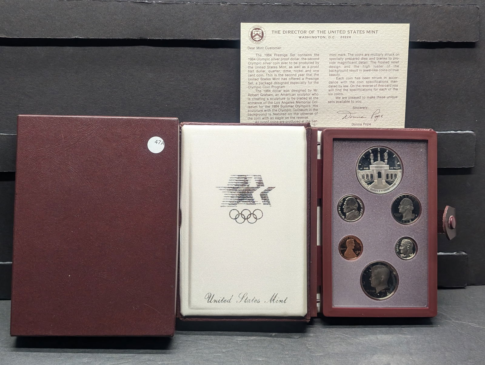 1984-S US Prestige Proof Set. Regular coins plus an Olympics Commemorative Silver Dollar. GEM in (1 of 4)