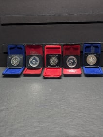 Lot of Five Various Dated Canadian Dollars in OGP