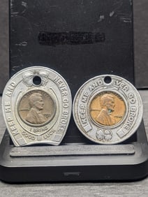 Two encased Lincoln Cents. 1955 Mello Drive In Restaurant Detroit MI and 1949 Rexall One Cent Sale.